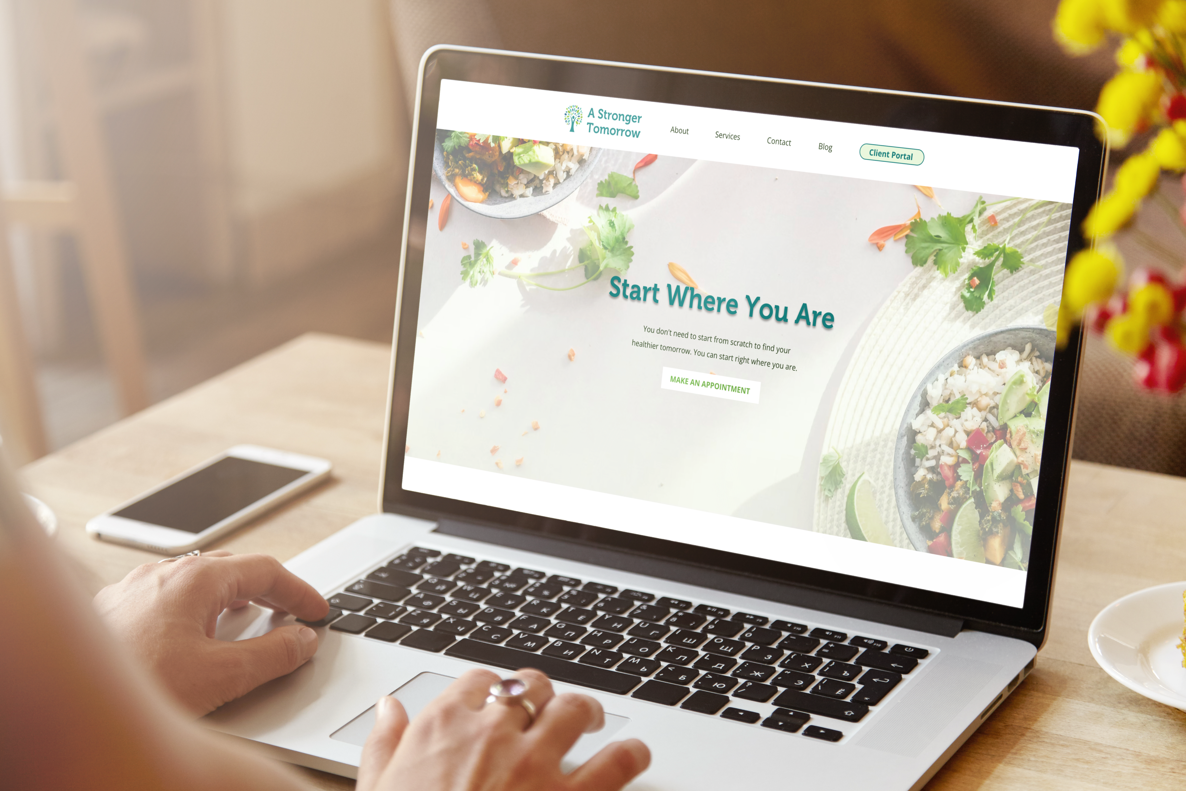 A Stronger Tomorrow website on laptop